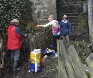 Mike getting cycling compost tips from Judith and Stuart